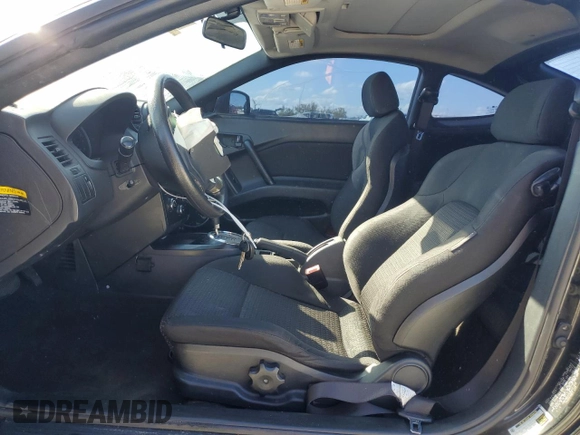 2008 Hyundai Tiburon GS z VIN KMHHM66D08U291605, wystawiony jako Copart lot #46589265 z przebiegiem 177 104 mil mil oraz Szkoda całkowita • Salvage title. Historia ofert i sprzedaży dostępna na DreamBid. Obrazek 7.