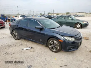 2016 Honda Civic EX-T z VIN 19XFC1F37GE012186, wystawiony jako Copart lot #51590575 z przebiegiem 121 041 mil mil oraz Szkoda całkowita • Salvage title. Historia ofert i sprzedaży dostępna na DreamBid. Obrazek 4.
