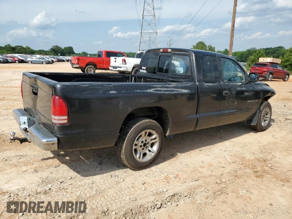 2001 Dodge Dakota z VIN 1B7GL22X81S204868, wystawiony jako Copart lot #57178895 z przebiegiem 298 667 mil mil oraz Szkoda całkowita • Salvage title. Historia ofert i sprzedaży dostępna na DreamBid. Obrazek 3.