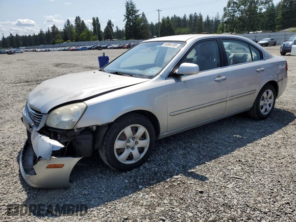 2008 Kia Optima LX z VIN KNAGE123185190108, wystawiony jako Copart lot #59364195 z przebiegiem 131 344 mil mil oraz Szkoda całkowita • Salvage title. Historia ofert i sprzedaży dostępna na DreamBid. Obrazek 1.