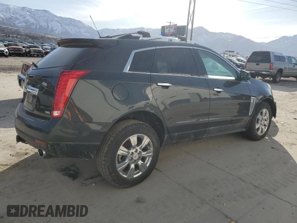 2015 Cadillac SRX Luxury Collection with VIN 3GYFNEE34FS619157, listed as a Copart auction lot 48331665 with 130,477 mi miles and Salvage Title. Bid and sale history available at DreamBid. Image 3.