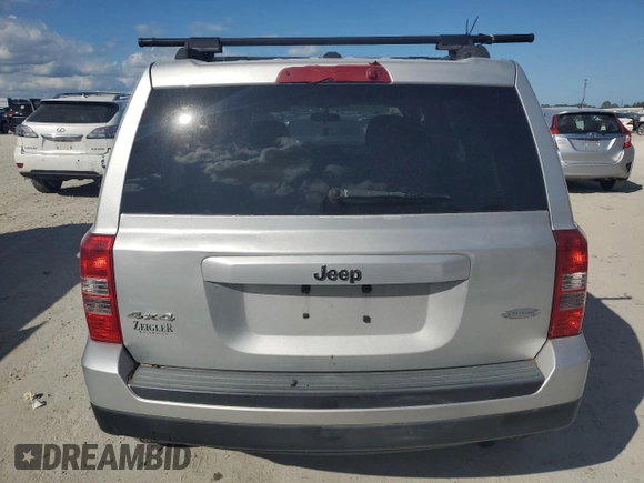 2011 Jeep Patriot Sport with VIN 1J4NF1GB6BD141811, listed as a Copart auction lot 77320484 with 123,966 mi miles and Salvage Title. Bid and sale history available at DreamBid. Image 6.
