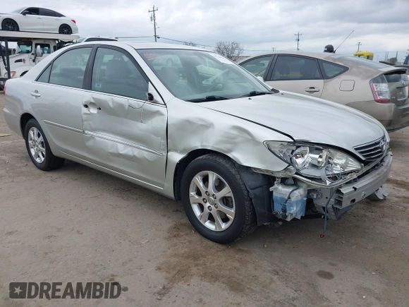 2005 Toyota Camry LE with VIN JTDBF30K650163057, listed as a IAAI auction lot 41730270 with 98,300 mi miles and . Bid and sale history available at DreamBid. Image 1.