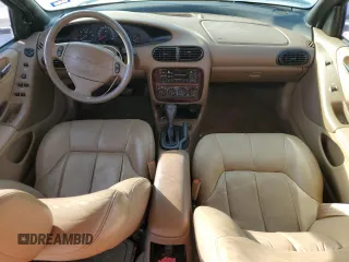 1998 Chrysler Cirrus LXi z VIN 1C3EJ56H2WN272336, wystawiony jako Copart lot #77888044 z przebiegiem 64 757 mil mil oraz Tytuł czysty. Historia ofert i sprzedaży dostępna na DreamBid. Obrazek 8.