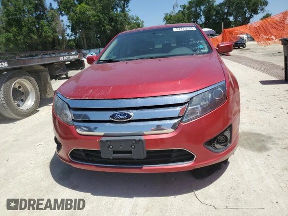 2012 Ford Fusion SE z VIN 3FAHP0HG0CR421694, wystawiony jako Copart lot #57179145 z przebiegiem 208 731 mil mil oraz Czysty tytuł • Clean title. Historia ofert i sprzedaży dostępna na DreamBid. Obrazek 5.