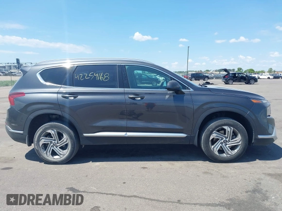 2022 Hyundai Santa Fe SEL z VIN 5NMS2DAJ2NH388129, wystawiony jako IAAI lot #42254168 z przebiegiem 46 780 mil mil oraz . Historia ofert i sprzedaży dostępna na DreamBid. Obrazek 13.
