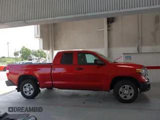 2019 Toyota Tundra SR with VIN 5TFRM5F16KX141657, listed as a IAAI auction lot 42395908 with 157,629 mi miles and . Bid and sale history available at DreamBid. Image 13.