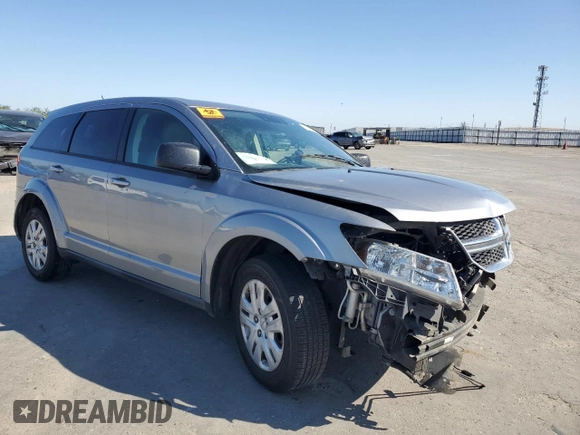 2015 Dodge Journey American Value with VIN 3C4PDCABXFT712192, listed as a Copart auction lot 55680975 with 104,579 mi miles and Salvage Title. Bid and sale history available at DreamBid. Image 4.