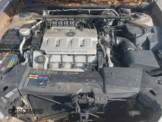 1998 Cadillac DeVille z VIN 1G6KD54Y3WU730001, wystawiony jako IAAI lot #42369702 z przebiegiem 88 540 mil mil oraz . Historia ofert i sprzedaży dostępna na DreamBid. Obrazek 10.