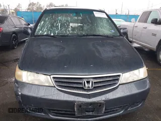 2004 Honda Odyssey EX-L with VIN 5FNRL18974B015769, listed as a IAAI auction lot 41533063 with 284,923 mi miles and . Bid and sale history available at DreamBid. Image 12.