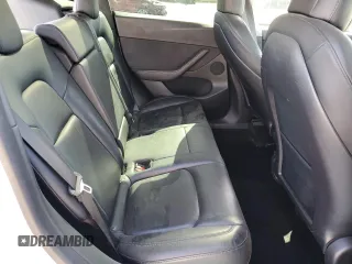 2021 Tesla Model Y Long Range z VIN 5YJYGDEE5MF275302, wystawiony jako Copart lot #54353875 z przebiegiem 63 196 mil mil oraz Szkoda całkowita • Salvage title. Historia ofert i sprzedaży dostępna na DreamBid. Obrazek 10.
