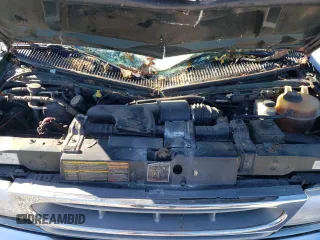 1999 Ford Econoline Passenger XL with VIN 1FBSS31L0XHB12679, listed as a Copart auction lot 74257504 with 136,821 mi miles and Salvage Title. Bid and sale history available at DreamBid. Image 12.