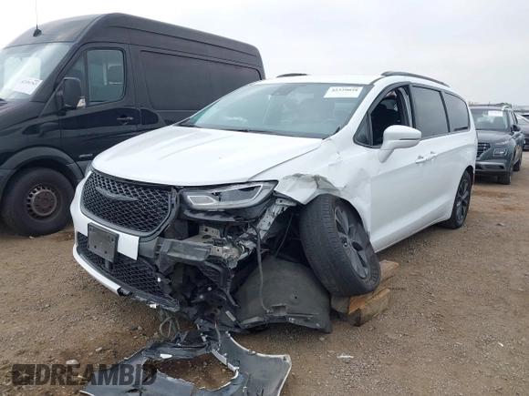 2021 Chrysler Pacifica Touring with VIN 2C4RC1FG7MR605587, listed as a IAAI auction lot 42329028 with 111,305 mi miles and . Bid and sale history available at DreamBid. Image 6.