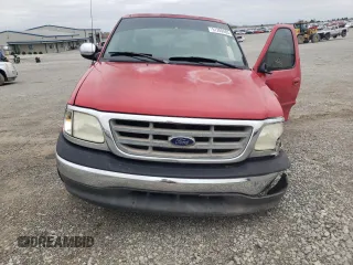 2002 Ford F-150 XL with VIN 1FTRX17W12NB06157, listed as a Copart auction lot 51209485 with 167,953 mi miles and Salvage Title. Bid and sale history available at carsss.com. Image 5.