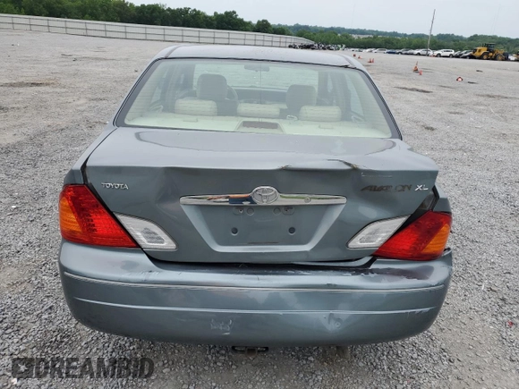 2000 Toyota Avalon XL with VIN 4T1BF28B2YU045935, listed as a Copart auction lot 57147225 with 164,261 mi miles and Salvage title. Bid and sale history available at DreamBid. Image 6.