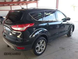 2015 Ford Escape Titanium with VIN 1FMCU0J98FUB95597, listed as a IAAI auction lot 41785188 with 84,141 mi miles. Bid and sale history available at carsss.com. Image 4.