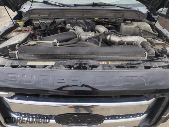 2015 Ford F-250 Lariat z VIN 1FT7W2BTXFEC34304, wystawiony jako Copart lot #55057775 z przebiegiem 128 368 mil mil oraz Szkoda całkowita • Salvage title. Historia ofert i sprzedaży dostępna na DreamBid. Obrazek 11.