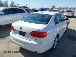 2012 Volkswagen Jetta SE with VIN 3VWDP7AJ3CM412988, listed as a IAAI auction lot 42528977 with 57,175 mi miles and . Bid and sale history available at DreamBid. Image 4.