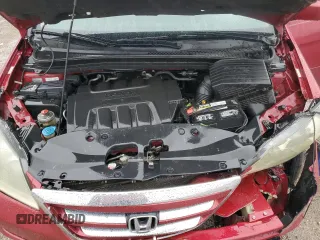 2006 Honda Odyssey EX-L z VIN 5FNRL38756B416802, wystawiony jako Copart lot #57588515 z przebiegiem 169 093 mil mil oraz Szkoda całkowita • Salvage title. Historia ofert i sprzedaży dostępna na DreamBid. Obrazek 12.