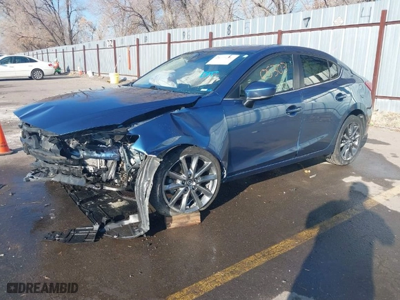 2018 Mazda Mazda3 4-Door Grand Touring with VIN 3MZBN1W38JM179689, listed as a IAAI auction lot 41305303 with 77,277 mi miles. Bid and sale history available at carsss.com. Image 2.