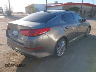 2014 Kia Optima SXL Turbo with VIN 5XXGR4A60EG351334, listed as a IAAI auction lot 41513606 with 174,382 mi miles and . Bid and sale history available at DreamBid. Image 4.
