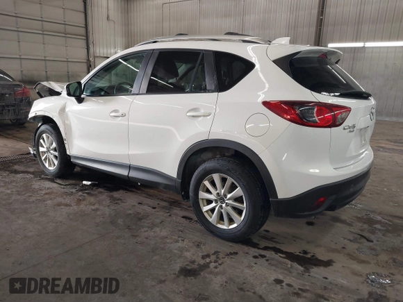 2014 Mazda CX-5 Touring with VIN JM3KE4CY4E0321055, listed as a IAAI auction lot 41613593 with 174,339 mi miles. Bid and sale history available at carsss.com. Image 3.