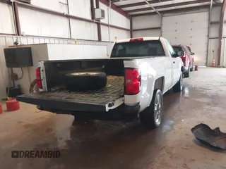 2014 Chevrolet Silverado 1500 Work Truck with VIN 1GCNKPEH5EZ266821, listed as a IAAI auction lot 41570036 with 125,916 mi miles and . Bid and sale history available at DreamBid. Image 4.