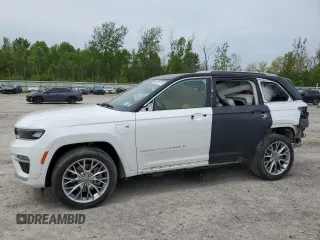 2022 Jeep Grand Cherokee Summit z VIN 1C4RJYE60N8767162, wystawiony jako Copart lot #58809775 z przebiegiem 26 678 mil mil oraz Szkoda całkowita • Salvage title. Historia ofert i sprzedaży dostępna na DreamBid. Obrazek 1.