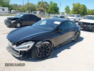 2021 Tesla Model S Plaid with VIN 5YJSA1E66MF452258, listed as a IAAI auction lot 41832000 with 42,845 mi miles and . Bid and sale history available at DreamBid. Image 18.