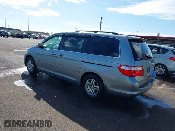 2007 Honda Odyssey EX-L with VIN 5FNRL38677B021464, listed as a IAAI auction lot 41568582 with 131,359 mi miles and . Bid and sale history available at DreamBid. Image 3.