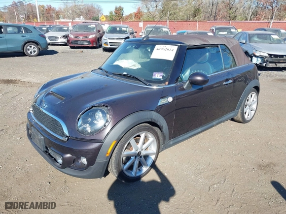 2013 MINI Cooper Convertible S with VIN WMWZP3C56DT705074, listed as a IAAI auction lot 40762024 with 57,685 mi miles. Bid and sale history available at carsss.com. Image 19.