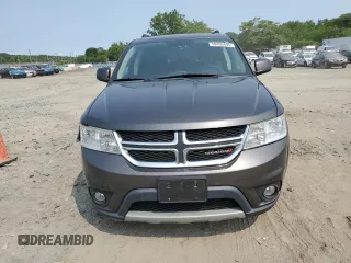 2017 Dodge Journey SXT z VIN 3C4PDCBG4HT531862, wystawiony jako Copart lot #59495495 z przebiegiem 187 780 mil mil oraz Szkoda całkowita • Salvage title. Historia ofert i sprzedaży dostępna na DreamBid. Obrazek 5.