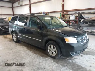 2010 Dodge Grand Caravan SXT with VIN 2D4RN5D19AR433481, listed as a IAAI auction lot 42123049 with 134,882 mi miles and . Bid and sale history available at DreamBid. Image 1.