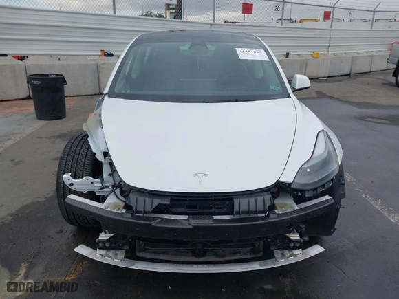 2022 Tesla Model 3 Performance with VIN 5YJ3E1EC0NF293544, listed as a IAAI auction lot 41451085 with 22,428 mi miles. Bid and sale history available at carsss.com. Image 13.