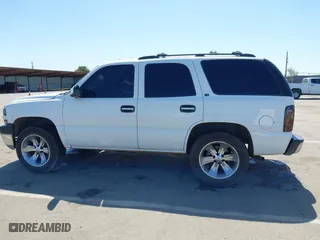 2001 Chevrolet Tahoe LT with VIN 1GNEC13T01J206365, listed as a IAAI auction lot 41960144 with 243,884 mi miles. Bid and sale history available at carsss.com. Image 14.
