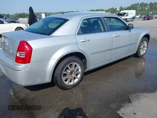 2008 Chrysler 300 Touring with VIN 2C3LK53G38H233492, listed as a IAAI auction lot 42004537 with 200,695 mi miles and . Bid and sale history available at carsss.com. Image 4.