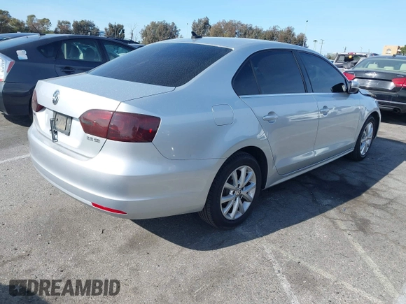 2013 Volkswagen Jetta Sedan SE with VIN 3VWDP7AJ5DM440793, listed as a IAAI auction lot 41936412 with 117,383 mi miles. Bid and sale history available at carsss.com. Image 4.