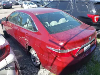 2015 Toyota Camry LE z VIN 4T1BD1FK2FU175195, wystawiony jako IAAI lot #41824458 z przebiegiem 118 490 mil mil oraz . Historia ofert i sprzedaży dostępna na DreamBid. Obrazek 3.