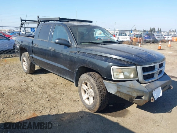 2010 Dodge Dakota Bighorn/Lonestar with VIN 1D7CW3GK1AS155513, listed as a IAAI auction lot 41437670 with 184,199 mi miles. Bid and sale history available at carsss.com. Image 1.