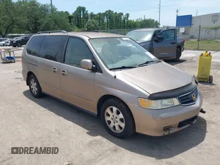 2003 Honda Odyssey EX-L with VIN 5FNRL18733B002370, listed as a IAAI auction lot 42080346 with 199,289 mi miles and . Bid and sale history available at DreamBid. Image 1.