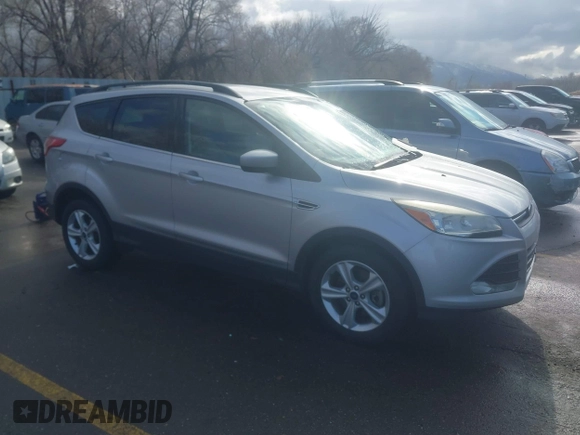2014 Ford Escape SE with VIN 1FMCU9GX9EUB98758, listed as a IAAI auction lot 41717257 with 126,358 mi miles. Bid and sale history available at carsss.com. Image 1.
