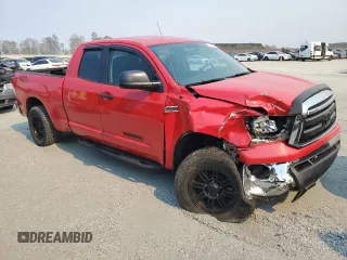 2011 Toyota Tundra 4WD Truck with VIN 5TFUW5F18BX177662, listed as a Copart auction lot 50690675 with 124,369 mi miles and Salvage Title. Bid and sale history available at carsss.com. Image 4.