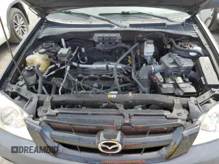 2005 Mazda Tribute i with VIN 4F2YZ02Z05KM51509, listed as a Copart auction lot 75985994 with Not Provided miles and Salvage Title. Bid and sale history available at carsss.com. Image 12.