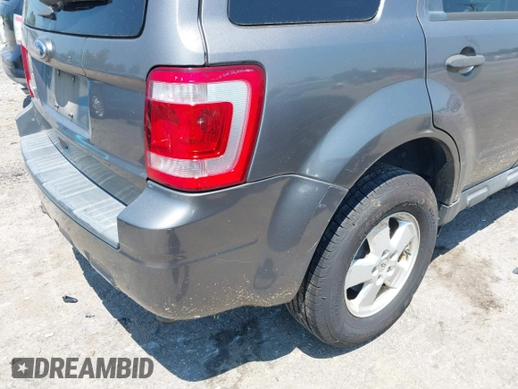 2011 Ford Escape XLT with VIN 1FMCU9D79BKC11522, listed as a IAAI auction lot 42844398 with 223,666 mi miles and . Bid and sale history available at DreamBid. Image 6.