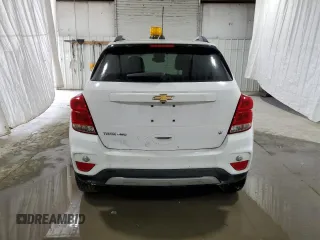 2018 Chevrolet Trax LT with VIN 3GNCJPSB5JL335123, listed as a Copart auction lot 52340495 with 107,257 mi miles and Salvage Title. Bid and sale history available at DreamBid. Image 6.