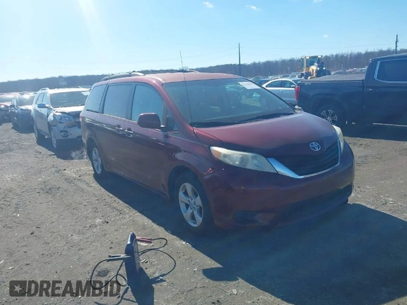 2012 Toyota Sienna LE AAS with VIN 5TDKK3DCXCS244605, listed as a IAAI auction lot 41516400 with 186,198 mi miles. Bid and sale history available at carsss.com. Image 1.