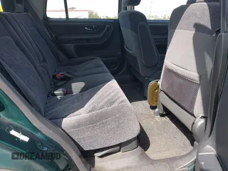 1999 Honda CR-V EX with VIN JHLRD1866XC028200, listed as a IAAI auction lot 42040657 with 207,397 mi miles. Bid and sale history available at carsss.com. Image 8.