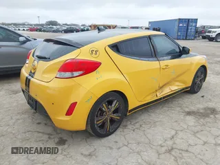 2013 Hyundai Veloster w/Black Int with VIN KMHTC6AD4DU167576, listed as a IAAI auction lot 41491479 with 90,033 mi miles and . Bid and sale history available at DreamBid. Image 4.