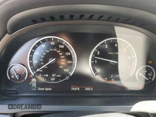 2011 BMW 7 Series with VIN WBAKX8C55BC198292, listed as a Copart auction lot 57907915 with 76,478 mi miles and Salvage title. Bid and sale history available at DreamBid. Image 9.