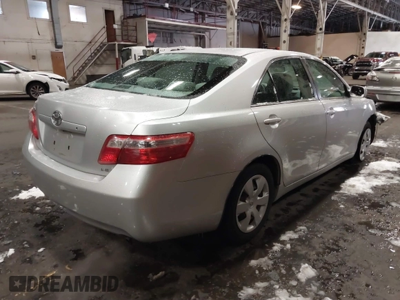 2009 Toyota Camry z VIN 4T1BE46KX9U352465, wystawiony jako IAAI lot #41518299 z przebiegiem 107 348 mil mil oraz . Historia ofert i sprzedaży dostępna na DreamBid. Obrazek 4.